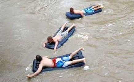 The teens on the swollen Bremer River, heading for South Bank. The teens on the swollen Bremer River, heading for South Bank.