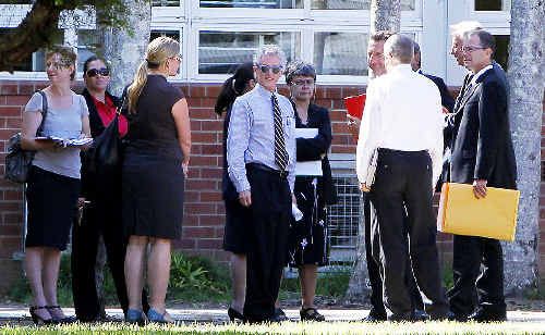 Deputy State Coroner Hugh Dillon (centre), leads the coronial inquest’s inspection of Mullumbimby High School where Jai Morcom was critically injured following a schoolyard brawl. Deputy State Coroner Hugh Dillon (centre), leads the coronial inquest’s inspection of Mullumbimby High School where Jai Morcom was critically injured following a schoolyard brawl.