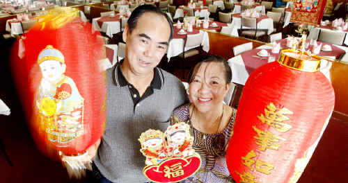 Binh and Kimly Chau prepare for the Chinese New Year at their family business, Go Sing Chinese Restaurant at Top of Town. Binh and Kimly Chau prepare for the Chinese New Year at their family business, Go Sing Chinese Restaurant at Top of Town.