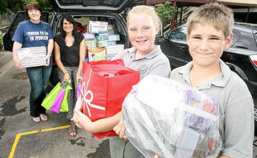 The Queensland Times’ Bernadette Mohr delivers The Queensland Times’ Bernadette Mohr delivers