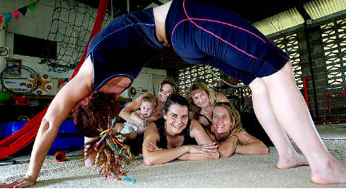 Lindy Duncombe performs a back arch while baby Peper Cardiff, Suzie Cardiff, Corina Saber, Michelle Anning, Tess O’Toole look on. Lindy Duncombe performs a back arch while baby Peper Cardiff, Suzie Cardiff, Corina Saber, Michelle Anning, Tess O’Toole look on.