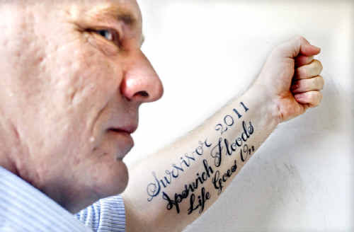 Flood Survivor Tattoos Take On Cq News
