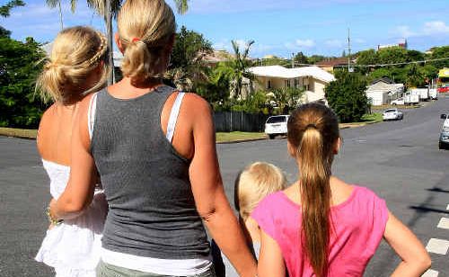Kim Russell and her children were injured by a motorist who failed to give way at the intersection of Steep and Adelaide streets, Tweed Heads. Kim Russell and her children were injured by a motorist who failed to give way at the intersection of Steep and Adelaide streets, Tweed Heads.