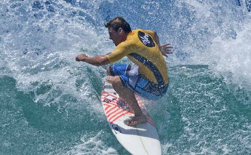 Snapper Surfriders competitor Clint Kimmons secures the Rhythm Kirra Teams Challenge spoils for his team ahead of Kirra at Duranbah Beach. Snapper Surfriders competitor Clint Kimmons secures the Rhythm Kirra Teams Challenge spoils for his team ahead of Kirra at Duranbah Beach.