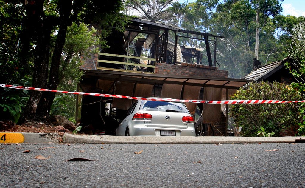 The house in Domain Drive was well alight when the QFRS arrived. The house in Domain Drive was well alight when the QFRS arrived.
