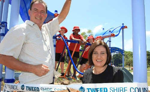 Tweed Mayor Kevin Skinner and Richmond MP Justine Elliot cut the ribbon at the Fingal boat harbour. Tweed Mayor Kevin Skinner and Richmond MP Justine Elliot cut the ribbon at the Fingal boat harbour.