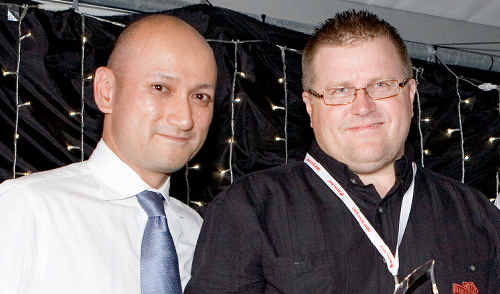 Glenn Shenton (right) receives his Operations Excellence award. Glenn Shenton (right) receives his Operations Excellence award.