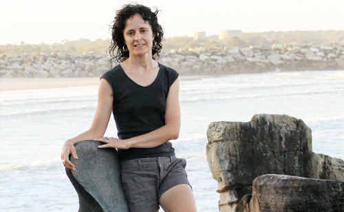 Maclean artist Cass Samms with her bronze sculpture at Turners Beach titled Furcula. Maclean artist Cass Samms with her bronze sculpture at Turners Beach titled Furcula.