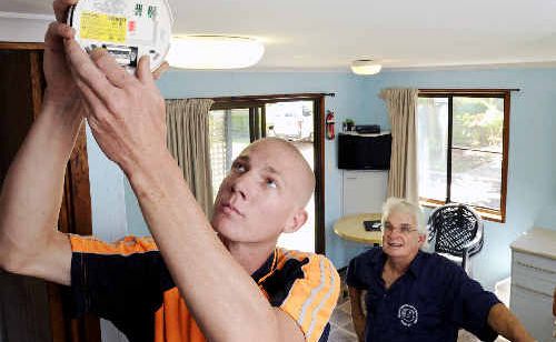 Suffolk Beachfront Holiday Park manager Paul Brooks watches as Elliot Dewhurst, from North East Electrical, performs a routine check on smoke alarms installed in one of their cabins. Suffolk Beachfront Holiday Park manager Paul Brooks watches as Elliot Dewhurst, from North East Electrical, performs a routine check on smoke alarms installed in one of their cabins.