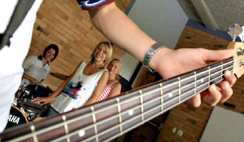 Kingscliff High School student Zoe Threlfo and organisers Kristie Hedley and Rhiannon Brinsmead prepare for Tweed Battle of the Bands. Kingscliff High School student Zoe Threlfo and organisers Kristie Hedley and Rhiannon Brinsmead prepare for Tweed Battle of the Bands.