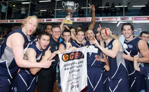 Rockets basketball team with QBL trophy. Rockets basketball team with QBL trophy.