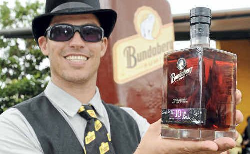 Collector Barry Bond with his latest bottle. Collector Barry Bond with his latest bottle.