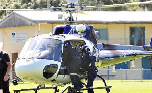 The Police Air Wing helicopter at Tumbulgum during last week’s drug raid. The Police Air Wing helicopter at Tumbulgum during last week’s drug raid.
