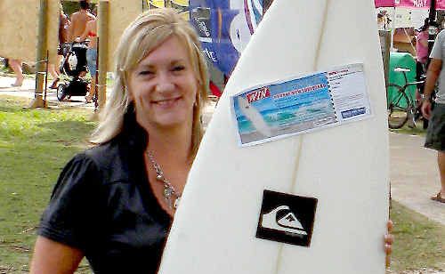 Gaye Breen shows off her new surfboard. Gaye Breen shows off her new surfboard.