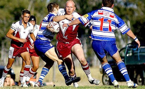 Scott Hall, in action (above) for Fassifern against Brothers, will line up for the Bombers over-35s while Joel Parcell (below left) and Sam Ward model the jerseys they will wear against each other on March 19. Scott Hall, in action (above) for Fassifern against Brothers, will line up for the Bombers over-35s while Joel Parcell (below left) and Sam Ward model the jerseys they will wear against each other on March 19.