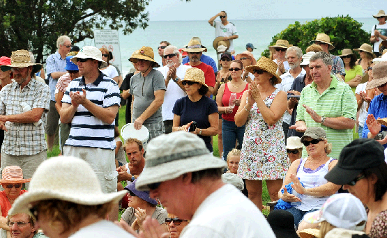 Hundreds of locals rallied at the Wall Against Sprawl protest held at Emerald Beach. Hundreds of locals rallied at the Wall Against Sprawl protest held at Emerald Beach.