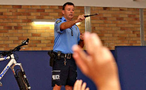 Tweed police crime co-ordinator Sergeant Stuart Crawford talks to students at Tweed Heads Public School. Tweed police crime co-ordinator Sergeant Stuart Crawford talks to students at Tweed Heads Public School.