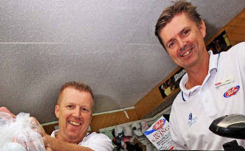 Tweed Heads-Coolangatta Golf Club Pro Shop staff, brothers Garry and Russ Davis, preparing for the charity golf event. Tweed Heads-Coolangatta Golf Club Pro Shop staff, brothers Garry and Russ Davis, preparing for the charity golf event.