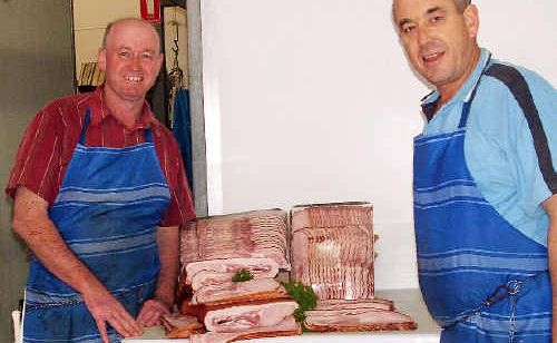 Mick Metcalf (left), Doug Flick and Mick Caspen with some of the national award-winning bacon. Mick Metcalf (left), Doug Flick and Mick Caspen with some of the national award-winning bacon.