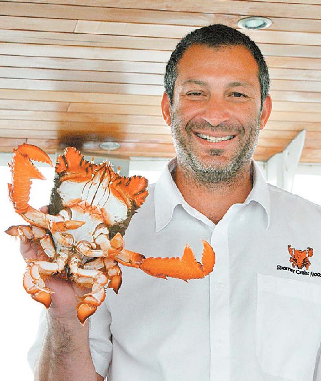 Spanner Crabs Noosa owner Jason Sgro with one of his favourite critters. Spanner Crabs Noosa owner Jason Sgro with one of his favourite critters.