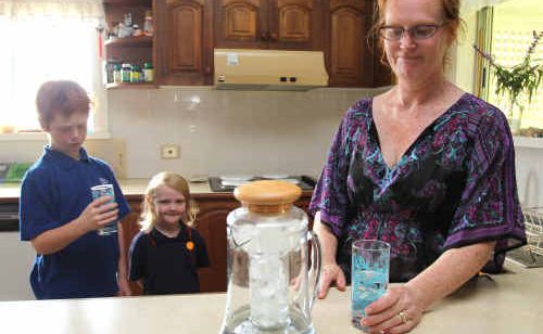 Murwillumbah resident Robyn Lemaire has concerns about the yellow-coloured water coming out of her taps. Murwillumbah resident Robyn Lemaire has concerns about the yellow-coloured water coming out of her taps.