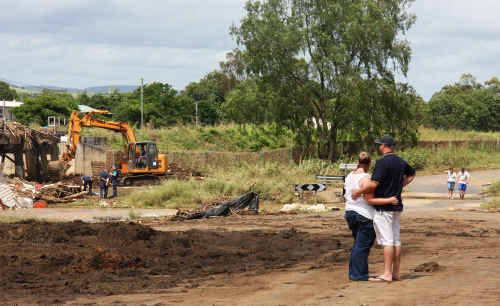 Grantham residents view the wreckage of their town. Grantham residents view the wreckage of their town.