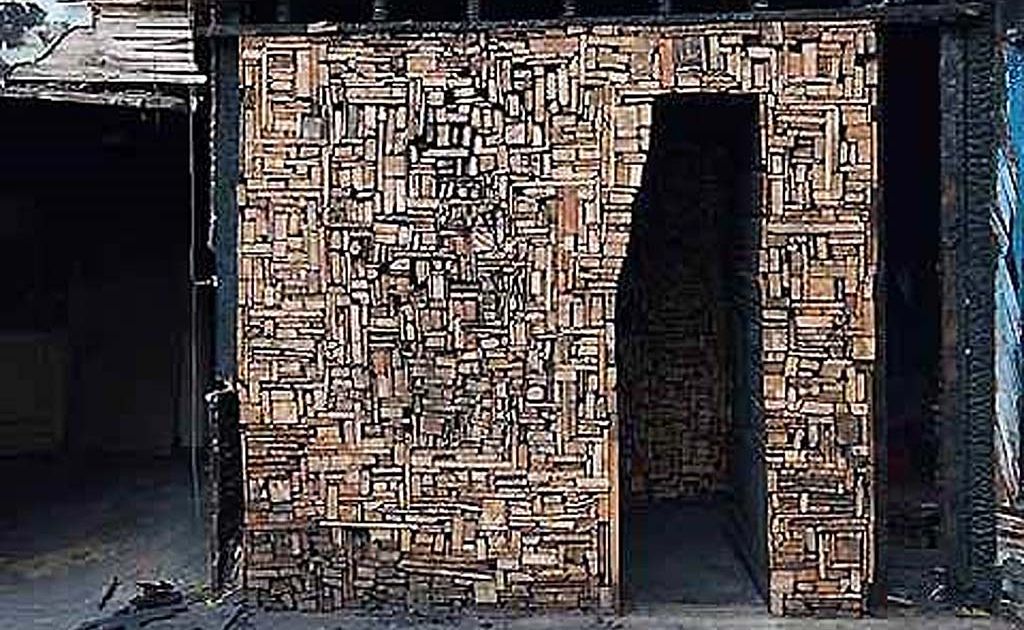 Artist Catie Newell, in collaboration with nonprofit Imagination Station, has embarked on a project called Salvaged Landscapes in which she collects burned and scrapped lumber from decimated neighborhoods and creates installations in uninhabitable buildings. Artist Catie Newell, in collaboration with nonprofit Imagination Station, has embarked on a project called Salvaged Landscapes in which she collects burned and scrapped lumber from decimated neighborhoods and creates installations in uninhabitable buildings.