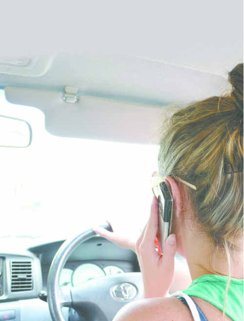Checking a mobile phone while driving is a crime many of us are guilty of but the next time you reach for the phone, ask yourself first, is it worth your life? Checking a mobile phone while driving is a crime many of us are guilty of but the next time you reach for the phone, ask yourself first, is it worth your life?