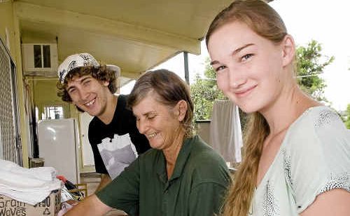 Volunteering at the Grantham food distribution centre are (from left) Cody Purton, Debbie Middleton and Casey Van Zelst. Volunteering at the Grantham food distribution centre are (from left) Cody Purton, Debbie Middleton and Casey Van Zelst.