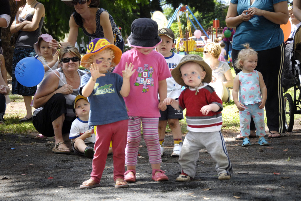 Lillie McMillan (left) dances with friends Sophie and Max Gray at a Toowoomba playgroup.