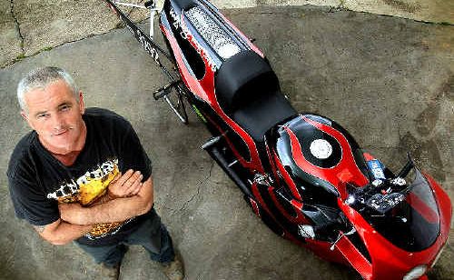 Mark Hancock has achieved his goal to break the national modified bike drag racing record. Mark Hancock has achieved his goal to break the national modified bike drag racing record.