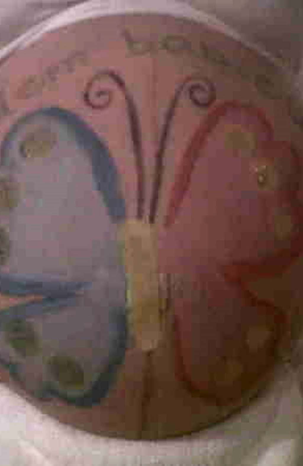 Mariah Carey painted her baby bump for her birthday.