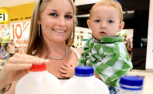 Fifty per cent of people chose Norco as their favourite milk in a taste test, but Vanessa McKinnon, pictured with son Blair, was among the minority, selecting Woolworths home-brand milk. Fifty per cent of people chose Norco as their favourite milk in a taste test, but Vanessa McKinnon, pictured with son Blair, was among the minority, selecting Woolworths home-brand milk.