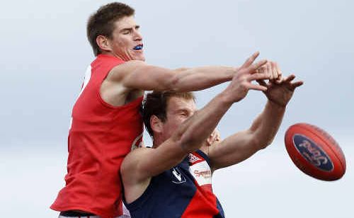 Zac Smith of the Gold Coast contests in the ruck against Andrew Browne of the Tigers during the round nine VFL match between the Coburg Tigers and the Gold Coast at Highgate Recreation Reserve on June 12, 2010 in Melbourne, Australia. Zac Smith of the Gold Coast contests in the ruck against Andrew Browne of the Tigers during the round nine VFL match between the Coburg Tigers and the Gold Coast at Highgate Recreation Reserve on June 12, 2010 in Melbourne, Australia.