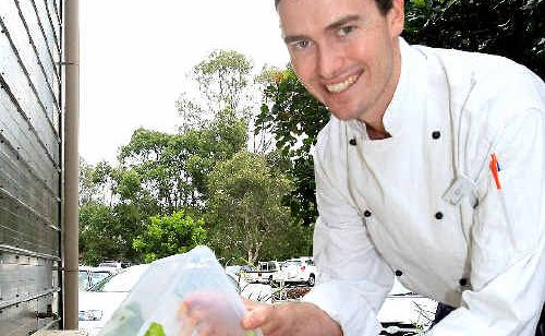Currumbin RSL sous chef Scott Atwood gets green with the grubs. Currumbin RSL sous chef Scott Atwood gets green with the grubs.
