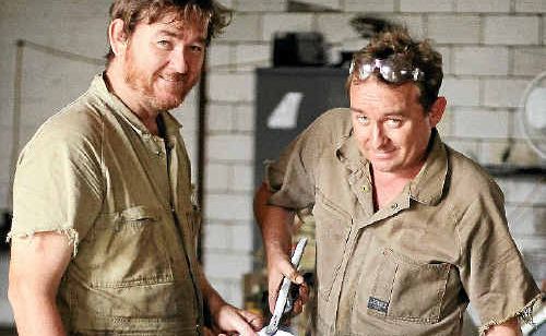 Tom and Paul at work. Tom and Paul at work.