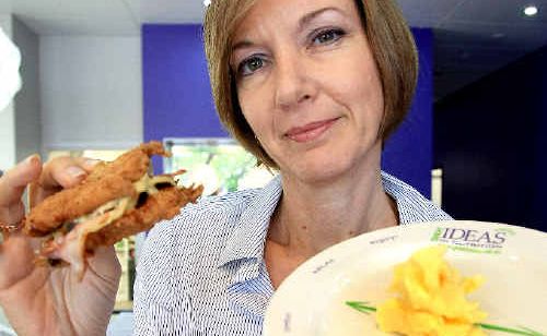 Author of Portion Perfection and Coolangatta dietician Amanda Clark shows how much fat is in KFC’s new bunless burger The Double Down. Author of Portion Perfection and Coolangatta dietician Amanda Clark shows how much fat is in KFC’s new bunless burger The Double Down.