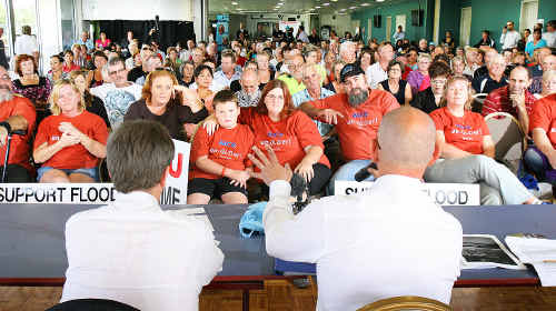 Flood victims face Blair MP Shayne Neumann (right) and Assistant Treasurer Bill Shorten MP at a meeting at Swifts in Booval yesterday. Flood victims face Blair MP Shayne Neumann (right) and Assistant Treasurer Bill Shorten MP at a meeting at Swifts in Booval yesterday.