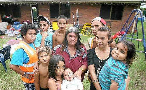 Sandra Shaw (centre) and her family are looking for a new place to live. Back L-R Isaiah Toby, Traviz Butler, Jefferson Butler, Trent Ahwang, and Michelle Butler with Sandra Butler. Front L-R Emmett Butler, Audrey Butler with Ivan Butler outside their former Gracemere home of seven years. Sandra Shaw (centre) and her family are looking for a new place to live. Back L-R Isaiah Toby, Traviz Butler, Jefferson Butler, Trent Ahwang, and Michelle Butler with Sandra Butler. Front L-R Emmett Butler, Audrey Butler with Ivan Butler outside their former Gracemere home of seven years.