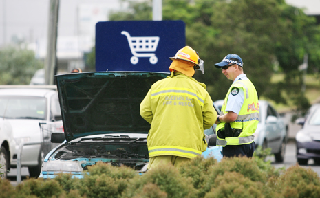 Police and fire crews attend to a car that caught fire in the Stocklands Rockhampton car park. Police and fire crews attend to a car that caught fire in the Stocklands Rockhampton car park.