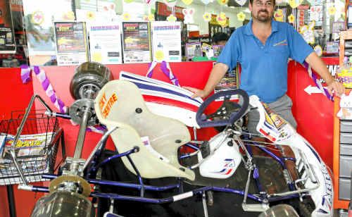 Mark Jamieson shows off the kart he will not be racing as he is one of the organisers for this round of the Supercheap Auto Karting series. Mark Jamieson shows off the kart he will not be racing as he is one of the organisers for this round of the Supercheap Auto Karting series.