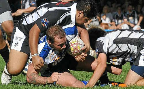 Ghost Troy Munro is caught between Magpies Dwayne Randall (left) and Robbie Howard during yesterday’s match at Frank McGuren Park. Ghost Troy Munro is caught between Magpies Dwayne Randall (left) and Robbie Howard during yesterday’s match at Frank McGuren Park.