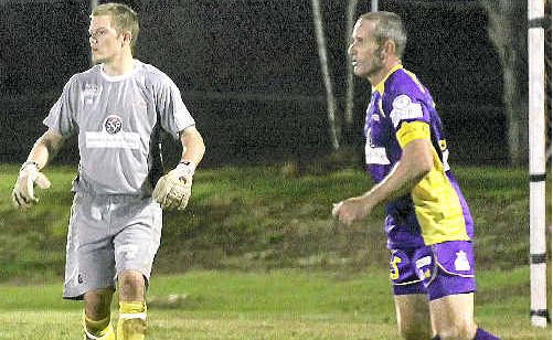 Cougars goalkeeper Tim English and captain Trevor Wood put in good displays against QAS. Cougars goalkeeper Tim English and captain Trevor Wood put in good displays against QAS.