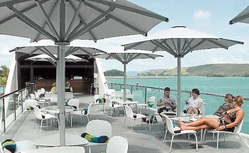 Relaxing on the long deck at Hamilton Island's yacht club, which has been nicknamed 'the opera house of Queensland'. Relaxing on the long deck at Hamilton Island's yacht club, which has been nicknamed 'the opera house of Queensland'.