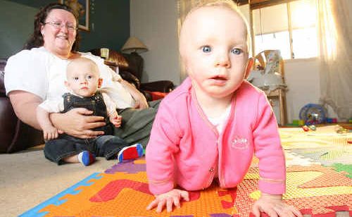 Debbie Smart with twins Lochie and Grace (right). Grace was diagnosed with congenital birth defect microtia and atresia. Debbie Smart with twins Lochie and Grace (right). Grace was diagnosed with congenital birth defect microtia and atresia.