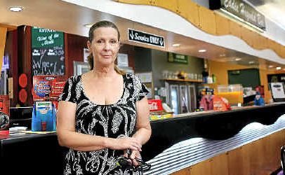 North Rockhampton Bowls Club manager Suzanne Lund at the club bar which was robbed by two masked thieves on Saturday night. North Rockhampton Bowls Club manager Suzanne Lund at the club bar which was robbed by two masked thieves on Saturday night.