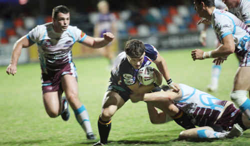 Tyron Haynes breaks through a tackle to score against the Mackay Cutters at Browne Park on Saturday. Tyron Haynes breaks through a tackle to score against the Mackay Cutters at Browne Park on Saturday.