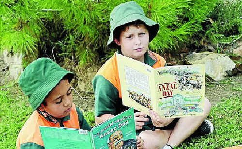 David Doolan, 11, and Mark Lisle, 11, are preparing for Anzac Day at Yarwun State School. David Doolan, 11, and Mark Lisle, 11, are preparing for Anzac Day at Yarwun State School.