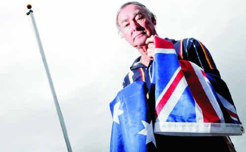Peter Madden wants to fly the national flag outside his house but management, Bremer Waters Retirement Resort, won’t allow him. Peter Madden wants to fly the national flag outside his house but management, Bremer Waters Retirement Resort, won’t allow him.