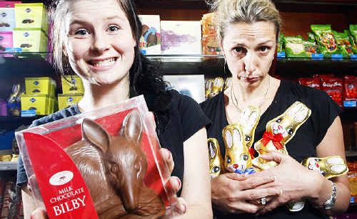Tamara Peters from Booval Fair News promotes the chocolate Easter bilbies as an alternative to the traditional bunny cradled by newsagency owner Jodie Armitage. Tamara Peters from Booval Fair News promotes the chocolate Easter bilbies as an alternative to the traditional bunny cradled by newsagency owner Jodie Armitage.